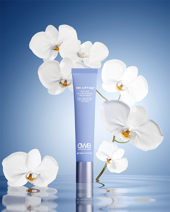 Photorealistic 3d render of a luxury lip product surrounded by orchids, created for beauty product launch